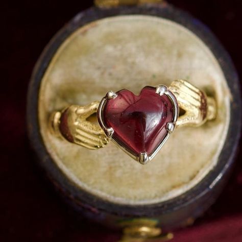 Gaetano Chiavetta on Instagram: "❤️🫶🏻❤️‍🔥😱 Inspired by the traditional Claddagh ring, this piece is crafted in 18 kt yellow gold, with a Sterling silver collet and set, at the centre, with a beautiful heart shaped garnet, in a cut down setting. The garnet at the centre measures 9x9 mm. Size: 7.1/4 Weight: 2.6 grams. Available here and now. Just please DM 😘 #gaetanochiavetta #heartring" Claddaugh Ring, Stone Flowers, Gothic Bride, Silver Claddagh Ring, Diy Jewelry Rings, Ring My Bell, Claddagh Ring, Claddagh Rings, Outfit Check