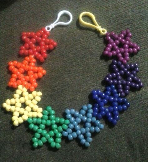 rainbow star belt chain Perler Belt Chain, How To Make A Star Out Of Beads, Kandi Star Belt Chain, Belt Chain Diy, Kandi Star Tutorial, Kandi Belt Chain, Kandi Chain, Kandi Belt, Kandi Star