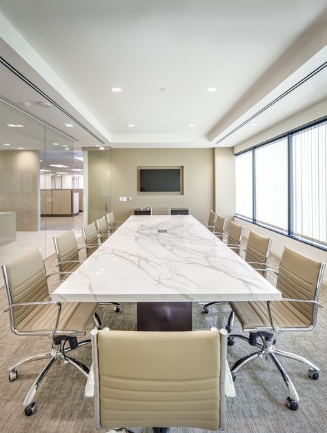 Neolith Calacatta Conference Table paired with Eames Management Chairs. | OllinStone.com 714-535-0800 Eames Management Chair, Conference Table Design, Conference Room Design, Meeting Room Design, Office Meeting Room, Corporate Office Design, Office Remodel, Modern Office Design, Design Room