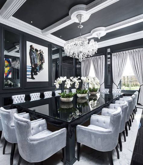 In the dining room, grey velvet arm chairs line the black lacquer table. Luxury Dining Room Decor, تصميم الطاولة, Monochrome Interior, Dining Room Table Decor, Luxury Dining Room, Elegant Dining Room, घर की सजावट, Luxury Dining, The Dining Room