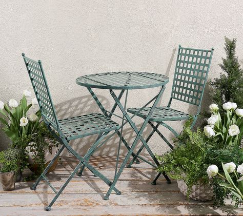 Lunch is served al fresco with this charming bistro set in your outdoor space. Ideally sized for compact balconies, front porches, or garden nooks, the powder-coated wrought iron construction is both weather- and corrosion-resistant. From Garden Reflections. Green Bistro Set, Wrought Iron Outdoor Table, Garden Nooks, Bistro Chairs Outdoor, Garden Nook, Outdoor Bistro, Bistro Table Outdoor, Brown House, Outdoor Bistro Set