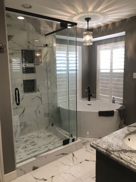 Bain tub in the corner. Pendant light from Pottery Barn Corner Pendant Light, Bathroom With Corner Tub, Corner Tub Shower Combo, Corner Tub Shower, Soaking Tub Shower Combo, Corner Soaking Tub, Luxury Spa Bathroom, Trendy Bathroom Tiles, Best Bathroom Vanities