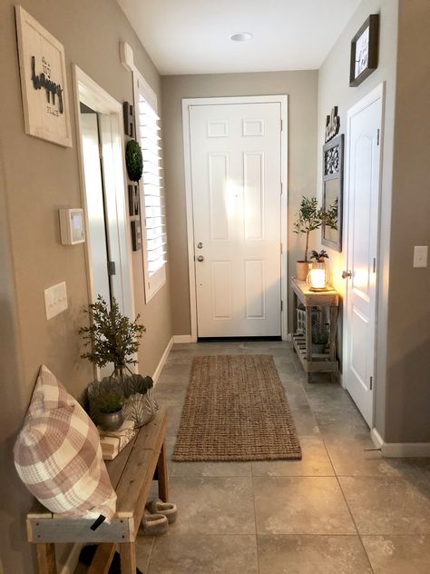 Styling an entryway can be a challenge when it’s small.   #entryway #farmhousestyle #homedecorideas #homedecor #foyer Apartment Entryway Ideas Narrow Hallways, Narrow Hallways, Apartment Entrance, Apartment Entryway, Trendy Apartment, Entry Ways, Small Entryways, Foyer Design, Entryway Ideas