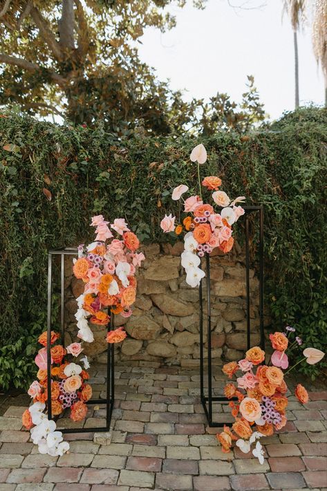 Fun & modern asymmetrical stands as wedding arch with bright florals by New Creations Flower Co, San Diego wedding florist; (Briana Nolan photo) Floral Arch Alternative, Floral Backdrops For Weddings, Column Ceremony Decor, 2024 Wedding Arch Trends, Asymmetrical Arbor Flowers, Backdrop Flowers Wedding, Flower Alter Wedding Floral Arch, Abstract Wedding Florals, How To Make Flower Arch Wedding