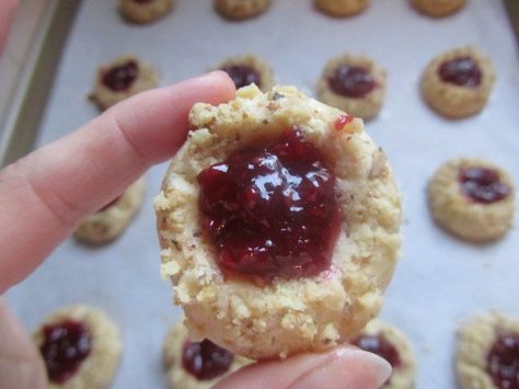 Next up for our Christmas Cookie Recipe Exchange is Carrie‘s Thimble Cookies. Here’s what she has to say about them, “As a child one of the best parts of the Christmas season was looking forward to the baked goodies my grandma would bring by our house. My mom did her own baking, but somehow Gram … Thimble Cookies, Cookie Exchange Recipes Christmas, Jam Thumbprints, Jam Thumbprint Cookies, French Toast Roll Ups, French Toast Rolls, Martha Stewart Recipes, Thumbprint Cookies Recipe, Cheesecake Cookies