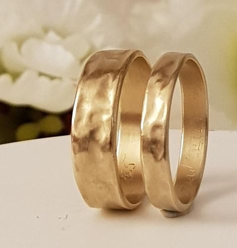 wedding bands his and hers Handmade solid 14k gold faceted bands set.RMG0265-Metal 14K gold-Weight 4.5grWidth ,6.3mmThickness 1mmRMG0432-Metal 14K-Weight 3.4gr,Width-4.2mm,Thickness-1.2mm,-CUSTOMIZATIONI can make the rings in any width and gold type (yellow, white or rose) the images can be used as a reference. Mens Bands, Organic Gold Ring, Hammered Gold Wedding Band, Wedding Rings For Couples, Her Wedding Rings, Rings 2022, Gold Wedding Band Set, His And Her Wedding Rings, His And Hers Rings