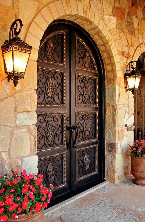 Forged iron door decoration in hacienda style are common down in Mexico and Southern United States. The style was used and is still in use for typical Spanish residential and public architecture. D… Spanish Style Doors, Mediterranean Front Doors, Modern Mediterranean Decor, Style Hacienda, Modern Mediterranean Homes, Hacienda Homes, Hacienda Style Homes, Eksterior Modern, Tuscan Design