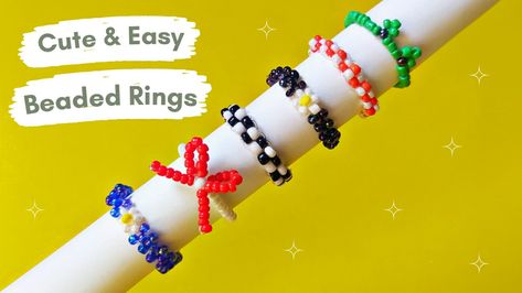 Learn how to to make cute beaded rings in this video on my YouTube channel.. I am making a cute Beaded Bow Ring , Beaded flower ring, checker ring , and Cute frog ring ... Diy Bead Flower, Beaded Frog, Beaded Flower Ring, Rings Tutorial, Frog Ring, Beaded Bow, Bead Rings, Diy Beaded Rings, Ring Tutorial