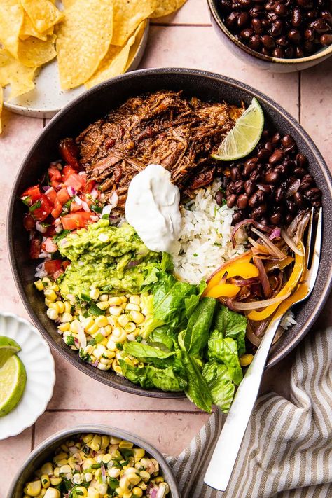 Chipotle Beef Burrito Bowls are a better copycat of your favorite chipotle bowl! Tender shredded beef over rice with all the best toppings. Chipotle Shredded Beef Crock Pot, Shredded Beef Burrito Bowl, Shredded Beef Bowls Healthy, Pulled Beef Burritos, Chipotle Beef Bowl Recipe, Burrito Bowl Beef, Crockpot Burrito Bowl, Brisket Bowl, Chipotle Beef Burrito