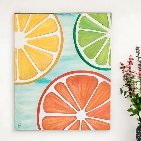 This painting conveys a profound connection between nature and human creativity. With the diversity of their colors, the slices of orange, lime and lemon symbolize the variety and richness of nature and life itself," says Costa Rican artist Jessica Brenes of her spectacular composition. Crafted with acrylics in light blue, white, orange, yellow and green, this remarkable artwork steals the spotlight and imbues any environment with life and vibrancy. Titled La Armonía de los Colores Cítricos in Spanish." Lemon Slice Painting Acrylic, Lemon Slices Painting, Painting On A Canvas Ideas, Fruit Slices Painting, Orange Acrylic Art, Orange Slice Painting Easy, Acrylic Crayon Art, Cute Lemon Painting, Sip And Paint Art Ideas