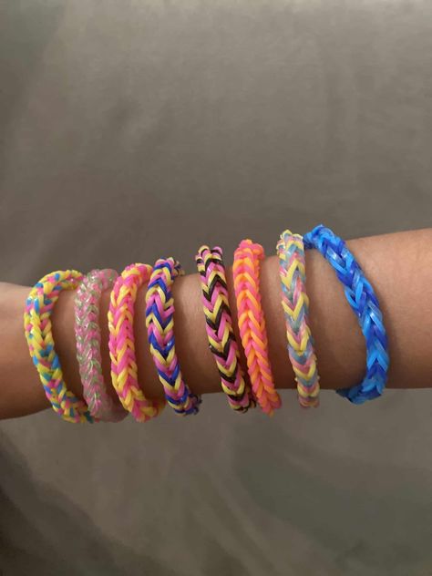 These colorful bracelets are handmade with rubber bands with a variety of patterns. Pick your preferred pattern by selecting the corresponding number for the bracelet you like.  These are children��’s size, but can be customized by request.  Each bracelet is sold individually. Rainbow Rubber Band Bracelet, Bracelet Rubber Band Ideas, Bracelet Ideas With Rubber Bands, Bracelet Ideas Loom, Bracelet Ideas Rubber Bands, Loom Bracelet Patterns Rubber Band, Loombands Bracelet, Rubber Band Bracelet Color Ideas, Rainbow Loom Color Combinations