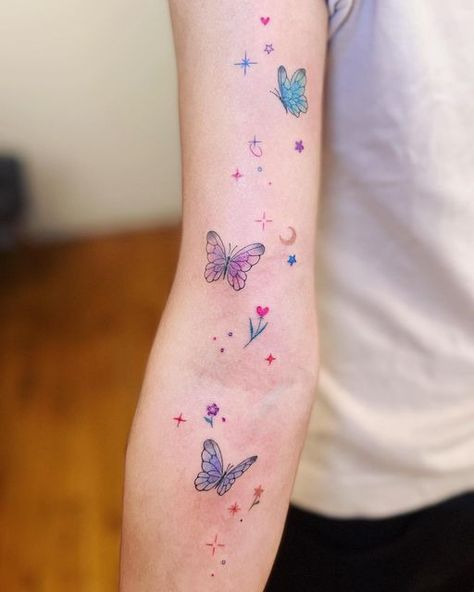 Pastel Butterfly Tattoo, Fairycore Lifestyle, Butterfly Sparkle Tattoo, Glitter Tattoos Real, Glitter Tattoo Ideas, Butterfly Tattoo Color, Sparkle Tattoos, Tattoo Types, Butterfly Leg Tattoos