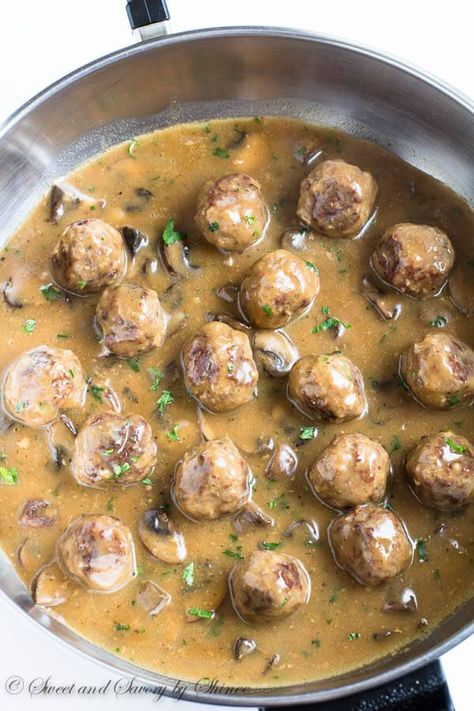 Juicy tender meatballs are first pan-fried for deliciously crispy exterior and then smothered in hearty mushroom gravy! Plus, learn how to make ton of meatballs for your freezer, step by step. Mushroom Meatballs, Meatballs And Gravy, Tender Meatballs, Beef Meatballs, Mushroom Gravy, Meatball Recipes, Sweet Savory, Gravy, Meatballs