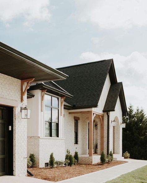 Exteriors Of Instagram on Instagram: "Swipe 👉 to see this home in all its beauty! Design/build by @stevenscustomhomes Project for @theblondehome Photos by @_chrissmithphotography_ #designbuild #customhomes #architecture #newconstruction #exteriordesign" White Brick House Exterior, Brick Farmhouse Exterior, Bunker Home, Brick Farmhouse, Exterior Finishes, Farmhouse Remodel, Brick Exterior House, Modern Farmhouse Exterior, White Brick