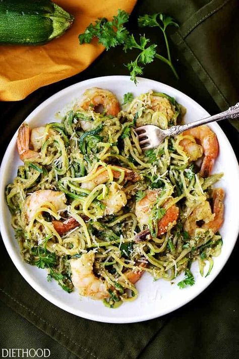 Pesto Zucchini Noodles and Shrimp is a quick and easy dinner recipe with tender zucchini noodles and sauteed shrimp tossed in a basil pesto sauce! #zucchininoodles #zucchinirecipe #healthynoodlerecipe #zoodles #pestoshrimp #pestonoodles #healthyrecipe Zucchini Noodles And Shrimp, How To Make Zoodles, Healthy Noodle Recipes, Zucchini Pesto Pasta, Pesto Zucchini, Zucchini Noodles With Pesto, Pesto Zucchini Noodles, Zucchini Soup Recipes, Pesto Shrimp