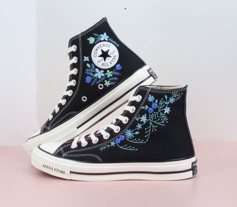 The Converse Chuck Taylor 1970s Embroidered, beautifully embroidered with purple flowers, perfect for the bride seeking a unique and stylish wedding look!   Detailed Product Information - Shoe Type: Converse (high tops or low tops) 👟 - Customization: Hand-embroidered flowers, bees, pets, songs, wedding bouquets, birthdays, wedding dates, and more. We can bring all your ideas to life! ✨🐝 - Material: Durable, unfading embroidery on new shoes purchased directly from the store 🏬 - Note About Size Black Converse With Flowers, Converse Embroidery Ideas Black, Embroidered High Tops, Converse Haute, Mens Suitcase, Flowers Shoes, Flower Wedding Shoes, Bride Personalized, Shoes For Bride