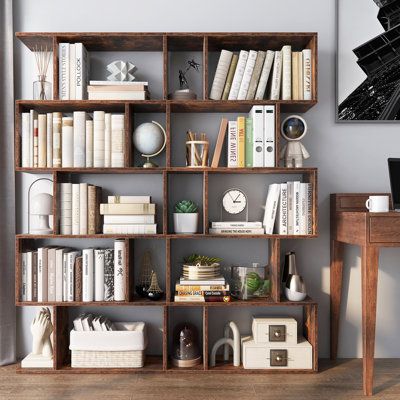 This geometric bookcase is an aesthetically-pleasing and practical addition to your home. It comes with 5-tier shelf to keep various items well-organized, bringing you a clean and tidy space. In addition, high-quality material ensures strong support and safe use. And the anti-toppling kits add extra safety. This s-shaped bookshelf can be placed at bedroom, study, living room as your mind. Color: Brown | Ebern Designs Rufio Bookcase 62.5 H x 27.5 W x 9.5 D in Wood in Brown | 62.5" H X 27.5" W X 9 Brown Bookshelves, Wide Bookshelf, Geometric Bookcase, Home Library Rooms, Creative Bookshelves, Large Bookshelves, Freestanding Storage Cabinet, Room Bookshelf, Living Room Transformation