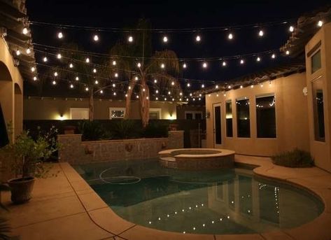 Hang string lights over pool idea. | 13 Breathtaking Ideas for Backyard String Lights Backyard String Lights Ideas, Christmas Lights Outdoor Ideas, Lanai Lighting, Pool Canopy, Backyard String Lights, Christmas Lights Outdoor, Diy String Lights, Hanging String Lights, Ideas For Backyard