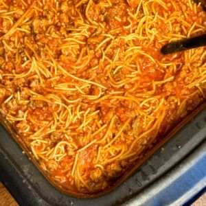 Spaghetti For A Crowd - Plowing Through Life Spaghetti For A Crowd, Sprinkle Salt, Dry Mustard, Tomato Juice, Nutrition Labels, Saute Onions, Ground Meat, Recipe Images, Pasta Sauce