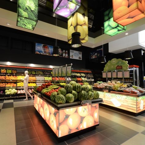 Every important area in the store has been emphasized with architectural interventions in the ceilings, floorings, furniture, lightning solutions and info graphics. Fruit And Veg Shop, Produce Displays, Vegetable Shop, Grocery Store Design, Retail Space Design, Food Retail, Retail Solutions, Supermarket Design, Fruit Displays