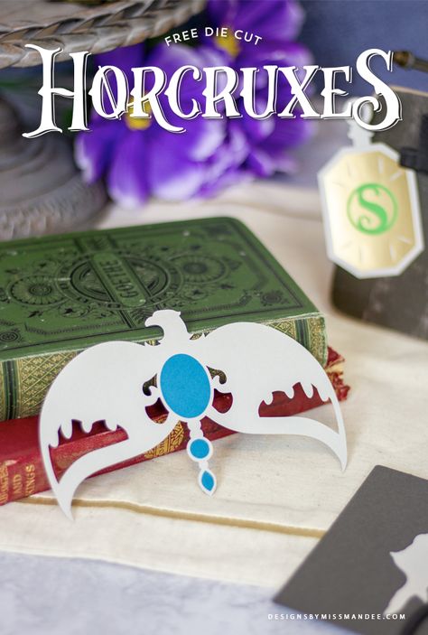 FREE Harry Potter Horcruxes – Harry Potter Cut Files - Designs By Miss Mandee. These horcrux designs are just what you need for your Harry Potter scrapbook page or classroom decorations! Download the cut files for Tom Riddle’s Diary, Marvolo Gaunt’s Ring, Salazar Slytherin’s Locket, Helga Hufflepuff’s Cup, Rowena Ravenclaw’s Diadem, Nagini, and Harry Potter's lightning bolt in this unique set! #HarryPotter #wizardingworld #FREEsvg #Freecutfiles #Cricut #Horcrux #HarryPotterParty Harry Potter Horcruxes, Horcruxes Harry Potter, Nagini Harry Potter, Harry Potter Lightning Bolt, Harry Potter Design, Harry Potter Scrapbook, String Lights Inside, Harry Potter Ornaments, Cumpleaños Harry Potter