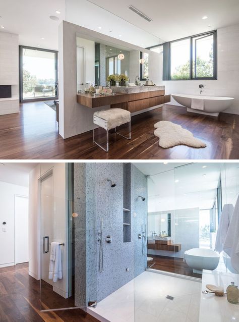 This master bathroom with dual showers and standalone bathtub, is tucked away behind a partition wall behind the bed. Standalone Bathtub, Tiered Seating, Architects Office, Open Dining Room, Modern Villa, Building Projects, Partition Wall, Luxury Homes Dream Houses, Decor Minimalist