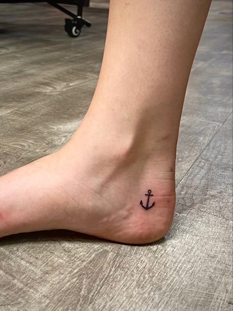 Small simple anchor tattoo on foot Mini Anchor Tattoo, Simple Anchor Tattoo For Women, Small Travel Tattoos, Simple Anchor Tattoo, Tiny Anchor Tattoo, Small Anchor Tattoos, Heel Tattoos, Small Foot Tattoos, Travel Tattoo Small