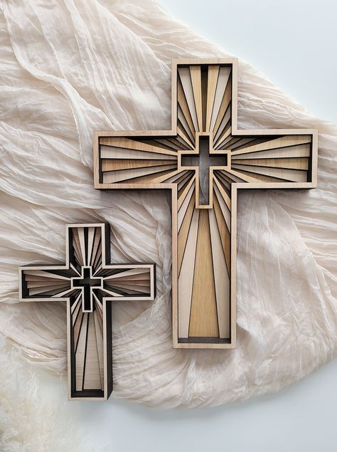 This handmade wood cross is a 6-layer piece using 1/4 Baltic Birch plywood.  It is stained and/or  painted, sanded, and sealed.  It comes in the following sizes: 7.5 X 9.5 11.5 X 15 The photos for this item show two different variations. Be sure and choose the correct variation during checkout.  While each piece is made with great care, there may be slight variations from one piece to the next. Cross Candles, Games Room Inspiration, Engraved Cross, First Apartment Decorating, Cross Crafts, Sailboat Painting, Diy Cross, Pictures Of Jesus Christ, Christian Cross