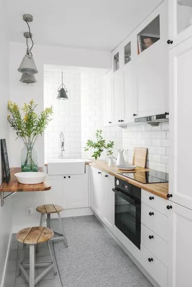 Small Kitchen Design Ideas That Will Make You Forget About Their Size | Hunker Long Narrow Kitchen, Small Kitchen Decoration, Model Dapur, Desain Pantry, Galley Kitchen Remodel, White Kitchen Remodeling, Kabinet Dapur, Small Kitchen Decor, Small Remodel