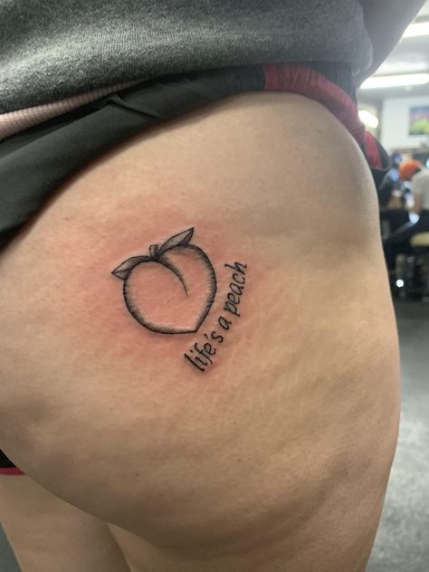 Cheek Tattoo For Women, Peach Tattoo Buttcheek, Bum Cheek Tattoo Women, Upper Buttock Tattoo, Tattoo Under Bum Cheek, Cheeky Tattoos, Small Tattoos On Bum Cheek, Cheek Tattoo, Buttcheek Tattoo