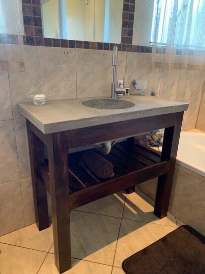 In love with a concrete bathroom vanity, but not happy about the pricetag? With this diy concrete bathroom vanity project, you can enjoy a stylish yet rugged look for your bathroom. diy | diy bathroom | bathroom | vanity| concrete vanity | concrete | bathroom vanity Concrete Bathroom Vanity, Concrete Vanity Top, Concrete Vanity, Cement Projects, Diy Cabinet Doors, Vanity Makeover, Bathroom Vanity Makeover, Concrete Bathroom, Large Salad