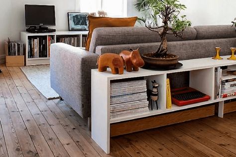 I really like this idea for a room divider bookcase behind the sofa. Can anyone suggest a bookshelf that will go behind the IKEA KIVIK sofa? Bookcase Behind Sofa, Bookcase Divider, Divided Living Room, Ikea Kivik Sofa, Shelf Behind Couch, Room Divider Diy, Sofa Shelf, Divider Bookcase, Kivik Sofa