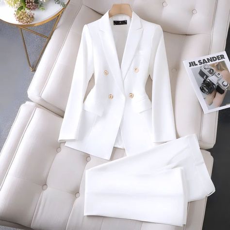 Elevate your office style with our Women's Suit! ✨ This sophisticated set pairs a sleek jacket with fashionable bell-bottom pants, perfect for making a statement at work or any business event. 💼👗 Comment Fashion for more info... #WomensSuit #BusinessAttire #OfficeFashion #BellBottoms #ChicStyle #WorkWear #FashionForward #PowerSuit #StyleInspo #ElegantLook #Fashionista Blazer Bleu, Womens Suits Business, Suit Jackets For Women, Navy Blue Suit, Job Interviews, White Suit, Normal Clothes, Business Pants, Blazer Set