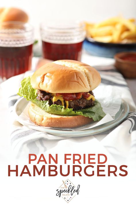 Want a burger but can’t fire up the grill? These Skillet Hamburgers, cooked on the stovetop, make the perfect dinner, no matter the time of year! Learn how easy it is to pan fry hamburgers. #EasyEntertaining #SpeckledPalate Pan Hamburgers, Pan Fried Burgers, Fried Hamburger Patties, Skillet Hamburgers, Pan Fried Hamburgers, The Best Hamburgers, Best Hamburgers, Best Hamburger Patty Recipe, Pan Burgers