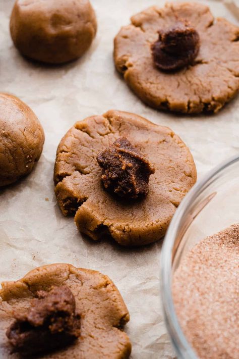 Snickerdoodle Cookies are a classic cookie, but I've upgraded them by stuffing them with my cinnamon roll filling and adding a luscious vanilla glaze. Soft brown butter snickerdoodles are stuffed with my cinnamon roll filling and baked to chewy, crisp-edged perfection. Top the warm cookies with a drizzle of vanilla glaze - these taste exactly like a cinnamon roll combined with a snickerdoodle cookie! Snickerdoodle Stuffed Cookies, Stuffed Snickerdoodle Cookies, Cinnamon Roll Filling, Chewy Snickerdoodle Cookies, Snickerdoodle Cookie, Stuffed Cookies, Snickerdoodle Recipe, Snickerdoodle Cookies, Vanilla Glaze