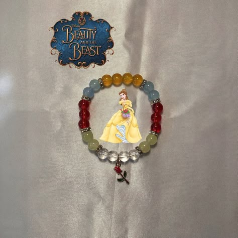 Disney Princess bracelets | Belle, Moana, Tiana, Lottie, Snowwhite, Rapunzel• Available in store linked in Shop• • • • • #beadedbracelets #beadedjewelry #charmbracelets #braceletsbymar #disney #instagood #braceletsoftheday #braceletsofinstagram #instagram #giftideas #rapunzel #snowwhite #moana #tiana #lottie #belle #tangled #princessandthefrog Princess Bracelets, Wired Jewelry, Bracelet Inspiration, Bracelets Diy, Beaded Bracelets Diy, Glass Beaded Bracelets, Moana, Rapunzel, Diy Bracelets