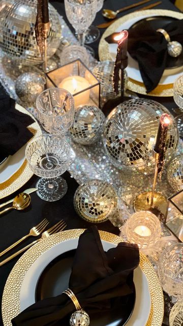 Rebirth Party Ideas, Glitzy And Glam Party, Glitz Glamour Party, Glitz And Glam Holiday Party, Black Gold Silver Disco Party, Black On Black Tablescape, Silver And Gold Table Decorations, Wedding Table Decor Disco Balls, Disco Christmas Tablescape