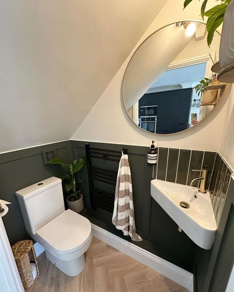 Tips to making a small downstairs bathroom come to life 🌿⁠
@kjhomespace⁠
⁠
1. Add panelling to give the room more definition⁠
2. Darker paint always is a fun idea in a small space⁠
3. A large mirror to give the illusion of a bigger space⁠
4. Corner sink to take up less room⁠
5. Adding different textures (tiles, paint, shelves, plants) to complete the interior ✨⁠
⁠
Swipe to see before 🤯⁠
⁠
#bathroom #smallbathroomideas #howtodecorate #interior #smallspace  #bathroomrenovation Under Stairs Loo Downstairs Toilet, Panelled Small Bathroom, Downstairs Toilet Corner Sink, Corner Sink Bathroom Mirror, Small Bathroom Ideas Under Stairs, Tiny Corner Sink, Powder Room With Corner Sink, Tiny Powder Room Layout, Small Downstairs Toilet Ideas Decor