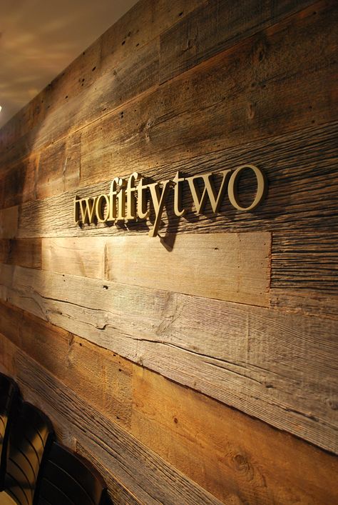 letters on reclaimed wood: The similar colors really help the sign display fit into it's surroundings. Office Signage, Interior Logo, Logo Wall, Sign Display, Wayfinding Signage, Environmental Design, 3d Logo, Environmental Graphics, Signage Design