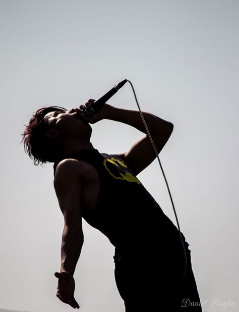 I Am Here Taken at a recent rock band competition more at http://justimage-n.blogspot.com/2015/02/i-am-here.html  #music #rock #band #rockmusic #singer #musician #silhouette #photography #dark #singing Singing With Microphone Pose, Rock Singer Pose Reference, Musician Moodboard, Singer Reference Pose, Singing Reference Pose, Singing Photoshoot, Singer Pose Reference, Singing Pose Reference, Musician Silhouette