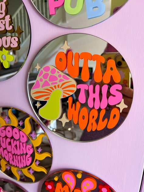 Outta This World Disc Mirror | 30cm

A unique and stylish mirror that will add a touch of cosmic wonder to your home. Perfect for adding a touch of personality to your bedroom, living room or hallway. #mirror #homedecor #space . #Customized_Mirror_Diy #Vinyl_On_Mirror_Ideas #Retro_Nail_Room #Cool_Mirror_Designs Vinyl On Mirror Ideas, Cool Mirror Designs, Cricut Wall Decor Ideas, Painting Mirror Ideas, Small Mirror Painting, Cute Mirror Ideas, Round Mirror Painting, Mirror With Stickers, Room Stickers Wall Decor