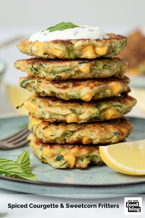 Courgette and Sweetcorn Fritters, lightly spiced, crispy and filling. Served with a minty, garlic and lemon yoghurt sauce these are perfect for lunch or as a tasty appetiser. Vegetarian and family-friendly. #courgettefritters #fritters #vegetarian #meals Sweetcorn Fritters Recipe, Courgette Recipes, Sweetcorn Fritters, Courgette Fritter, Yoghurt Sauce, Dump Recipes, Canning Sweet Corn, Fritters Recipe, Tasty Lunch