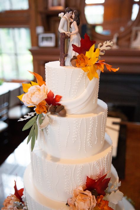 Our wedding cake by Zingermans Bakery - Ann Arbor Michigan. Fondant design was created to match my dress and the fall flowers and leaves were so amazing. #michiganwedding #fallthemewedding #zingermansbakery #weddingcake #wellerscarriagehouse Fall Wedding Cake Ideas Burgundy, Fall Wedding Cake Designs, Wedding Cake Olive Green, Fall Theme Wedding Cake, Rustic Fall Wedding Cake, Wedding Cake Olive, Fall Theme Wedding, Fall Themed Wedding Cakes, Autumn Wedding Cake