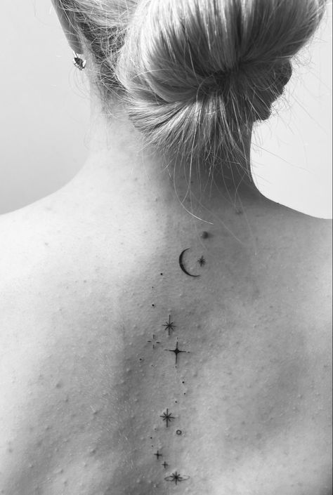 black and white picture of a spinal moon and star tattoo Stars On Spine Tattoo, Stars Down Spine Tattoo, Black And White Spine Tattoos, Galaxy Spine Tattoos For Women, Night Sky Tattoos For Women, Moon And Stars Spine Tattoo, Spine Tattoo Stars, Stars Spine Tattoo, Star Spine Tattoo