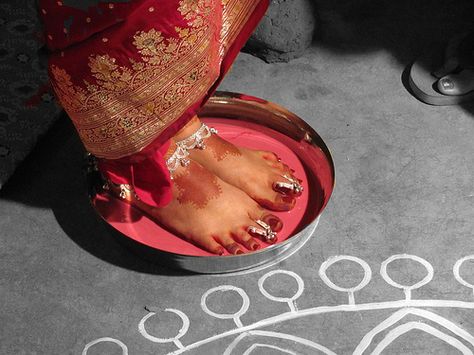 The+feet+dipped+in+a+mixture+of+milk+and+alta(lac+dye) Hindu Wedding Decorations, Hindu Wedding Invitations, Hindu Wedding Ceremony, Hindu Wedding Cards, Hindu Rituals, Bengali Wedding, Wedding Mandap, Wedding Rituals, Wedding Attire Guest