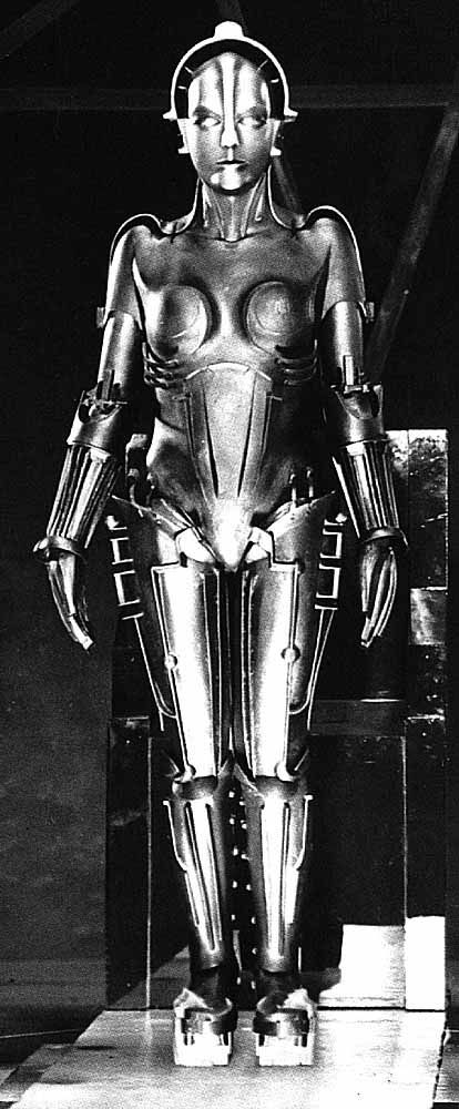 A representation of the Cyborg via Metropolis. Cyborg theory was created by Donna Haraway in order to criticize traditional notions of feminism—particularly its strong emphasis on identity, rather than affinity. She uses the metaphor of a cyborg in order to construct a feminism that moves beyond dualisms and moves beyond the limitations of traditional gender, feminism, and politics. Brigitte Helm, Metropolis Film, Mystic Woman, Metropolis 1927, Robot Suit, Fritz Lang, Fantasy Stuff, Movie Moments, Youtube Design