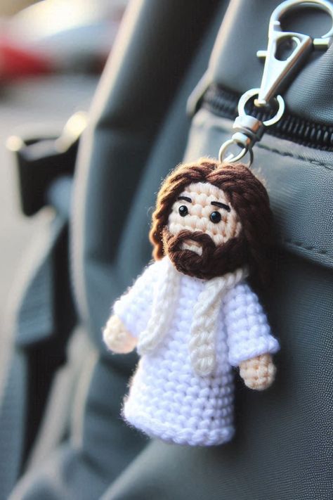 Learn how to crochet a simple and meaningful Amigurumi Jesus keychain with this quick and easy tutorial. Perfect for all skill levels. Crochet Ideas For Sell, Crochet Cross Keychain Pattern Free, Crochet Bible Characters, Crochet Cross Keychain, Jesus Crochet Free Pattern, Small Crochet Gifts Simple, Cross Crochet Pattern Free, Crochet Keychains For Men, Crochet Gifts For Brother