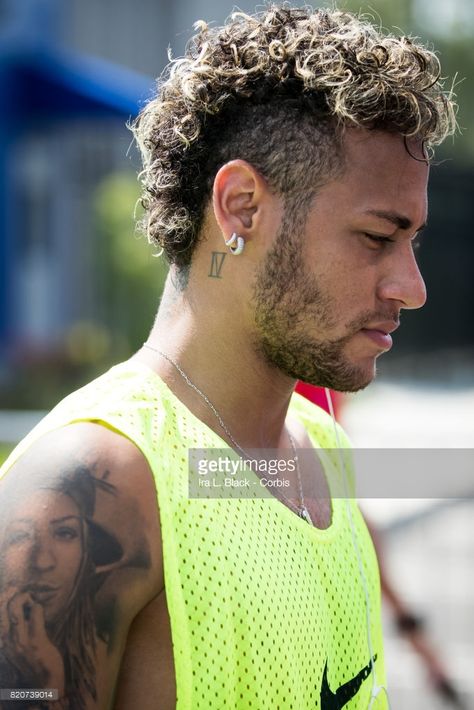 Neymar #11 of Barcelona leaves the International Champions Cup Barcelona training session prior to the match between FC Barcelona and Juventus at the Red Bull Training Facility on July 20, 2017 in Whippany, New Jersey. Neymar 2017, Hairstyle Neymar, Boys Haircuts Long Hair, Neymar Jr Tattoos, Neymar Jr Hairstyle, Barcelona Training, Men Fade Haircut Short, Mullet Hair, Mohawk Hairstyles Men