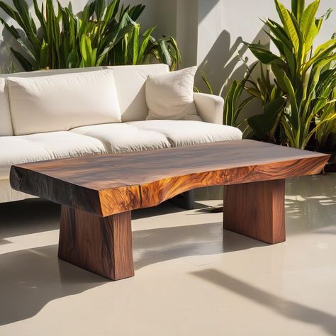 Add a touch of luxury and sophistication to your living space with our handmade solid walnut coffee table, a stunning blend of natural beauty and expert craftsmanship. Carefully made from the finest walnut wood, this piece exudes warmth and elegance, making it a perfect centerpiece for any modern or classic setting. Each coffee table is crafted from solid walnut slabs, known for their rich, deep tones and captivating grain patterns. The natural beauty of walnut is highlighted by the wood's organ Natural Edge Coffee Table, Reclaimed Wood Coffee Table Rustic, Unique Wood Coffee Table, Wood Slab Coffee Table, Unique Coffee Table Design, Walnut Coffee Table Modern, Coffee Table Unique, Rustic Wooden Coffee Table, Coffee Table Walnut