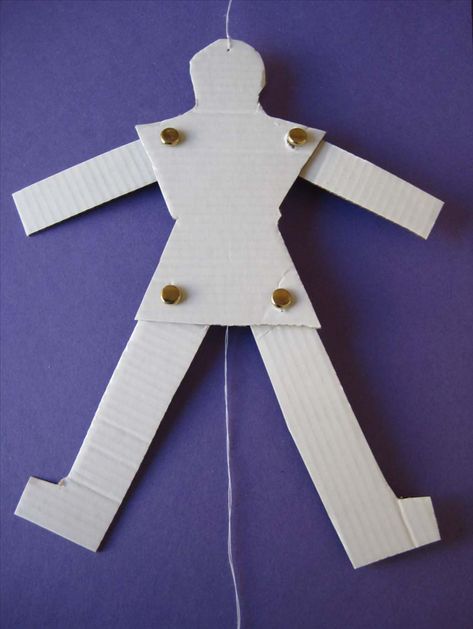 This guide will show you how to make a jumping puppet, also known as a Jumping Jack.  It is hung on a door knob or nail on the wall and when  the bottom string is pulled its arms and legs move up and down. Simple Marionette Puppet, Paper Doll Chain, Puppet Template, Cucumber Trellis Diy, Pictures On String, Puppets Diy, Marionette Puppet, Paper Puppets, Puppet Crafts